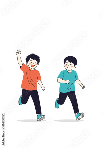 Two happy young boys running together in a race and having fun playing outdoors
