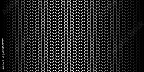 Abstract dark gray steel mesh pattern. Metallic steel mesh pattern with circular holes for an industrial grid background. perforated steel speaker grill. Abstract grunge dark and blue geometric