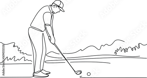 Golfer ready to strike the ball on a scenic golf course during daytime