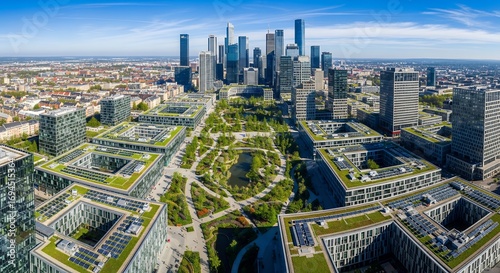 Aerial view of modern city with green roofs and central park under blue sky, concept for sustainable architecture, urban planning and corporate responsibility initiative