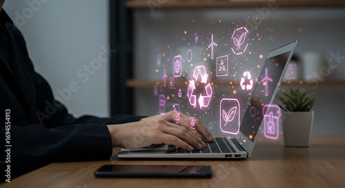 Businessman typing on laptop with holographic interface, glowing eco icons for sustainability, recycling, and green technology concept