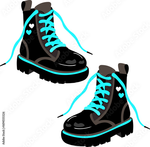 A pair of black, chunky punk-style boots with thick soles and vibrant turquoise laces. Each boot is accented with a small white and turquoise heart on the side, adding a playful yet rebellious touch. 