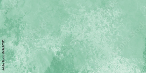 Abstract Elegant dark green background with mottled vintage texture in old fancy background design, texture of colored parchment paper.	