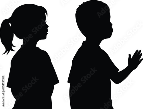 Black Silhouette of Two Young Children Standing Side by Side on White Backdrop