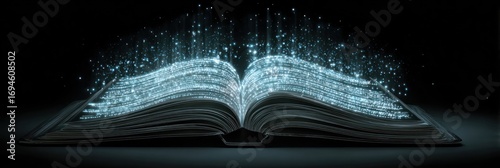 Open book with glowing particles