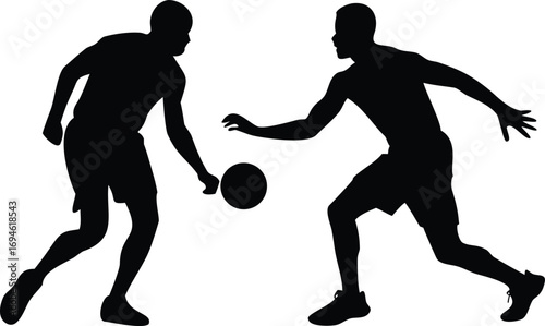 Two basketball players silhouette action shot dribbling the ball, defense and offence