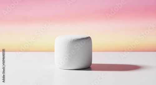 White Marshmallow on White Surface with Gradient Background