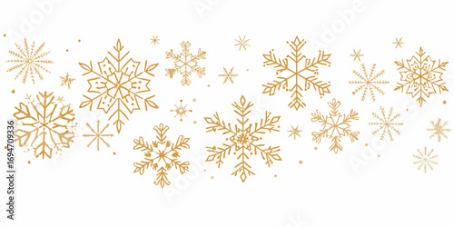 Elegant gold snowflakes and dots scattered across a clean white background for winter holidays