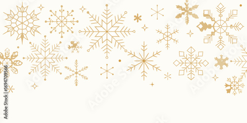 Wallpaper Mural Elegant gold snowflakes and starbursts scattered across a cream background for winter holidays Torontodigital.ca