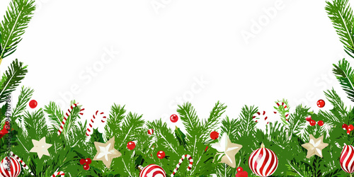 Festive christmas border with green fir branches candy canes ornaments and holly berries