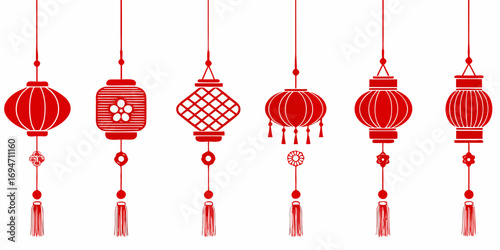 Collection of traditional red chinese lanterns with tassels and decorative elements hanging