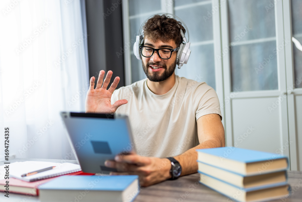 Fototapeta premium Student with Glasses Attending Online Class