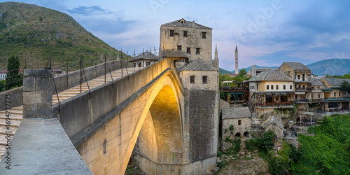 Majestic beauty of Mostar Old Bridge illuminated at dusk in Bosnia and Herzegovina