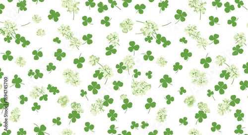 Charming pattern of green clover and white flowers on a clean background