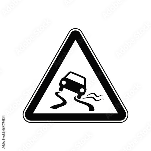 Warning sign indicating slippery road ahead due to wet conditions, with a car skidding on a curved path, alerting drivers to potential hazards on the road