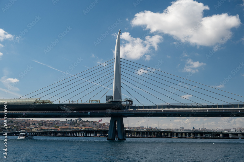 Fototapeta premium The various architectural views and perspectives of the Golden Horn Metro Bridge, located in the touristy Eminönü Golden Horn district of Istanbul, its cable-supported design and engineering structure