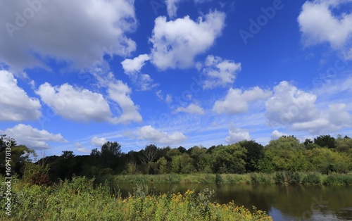 Pilica River between the bridges clouds over the river 