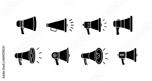 Set of megaphone icons in flat silhouette style for communication themes