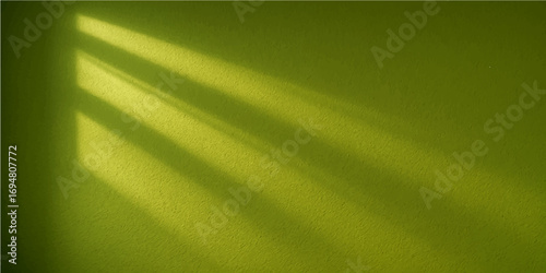 Soft flowing green silk texture with a smooth wave pattern creates a gentle abstract design