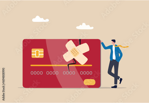 Credit repair, process to fixing poor credit standing, recover from financial mistake or negotiate with lender concept, confidence businessman stand with fixed and repaired credit card with bandage.