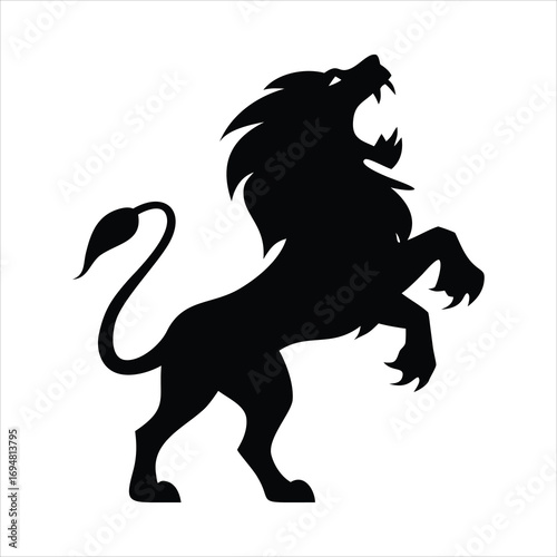 Black silhouette of a lion roaring and standing on its hind legs