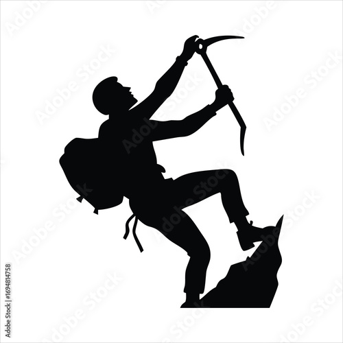Silhouette of a climber ascending a rocky mountain with an ice axe