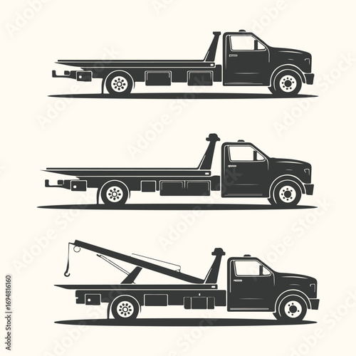 Vector art of three different tow truck silhouettes