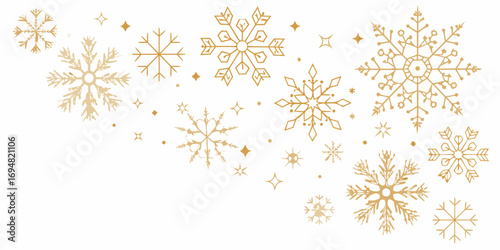 Elegant gold snowflakes and stars scattered on a clean white background for winter holidays
