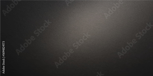 Dark, textured metal surface with a gray grunge pattern