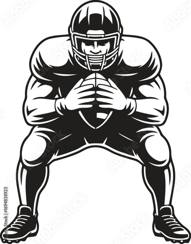 American football player in ready stance holding the ball