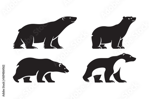 Four silhouettes of polar bears in different poses