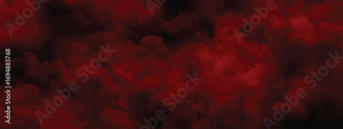Red smoke texture blending with deep shadows in abstract background