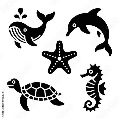 Black and white vector illustration of sea animals including a whale dolphin starfish sea turtle and seahorse for ocean themed designs and educational resources perfect for children's books