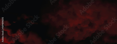 Dramatic crimson smoke cloud forming thick texture in dark backdrop