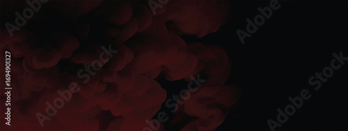Intense red smoke cloud texture spreading across black background in abstract design
