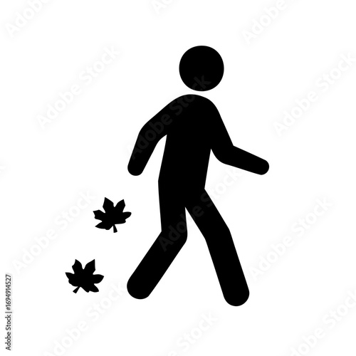 Icon of a person walking amidst falling leaves representing autumn stroll