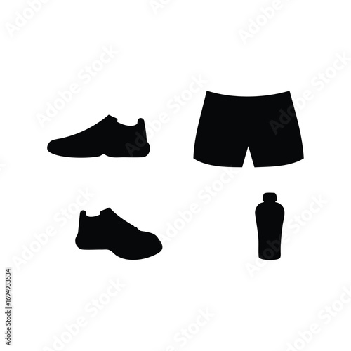 Silhouette of running gear including running shoes, shorts, and water bottle