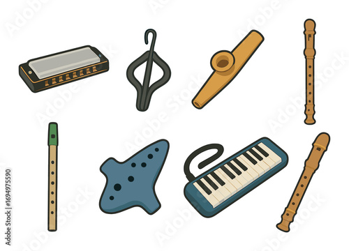 Collection of assorted musical instruments on wooden background