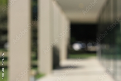 A dreamy view of a modern column on the portico.