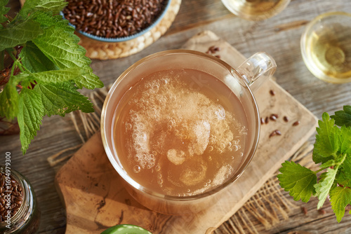 Homemade flax seed gel, nettle, argan oil, apple cider vinegar - ingredients for natural diy shampoo. Alternative haircare.