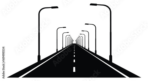 a long road with streetlights leading into distance silhouette