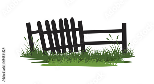 a wooden fence leaning over grassy area silhouette