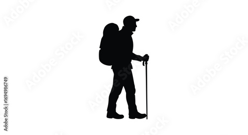 a hiker with backpack walking using trekking poles silhouette