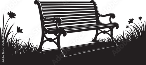 Silhouette of a vintage park bench with surrounding grass and flowers in black and white.