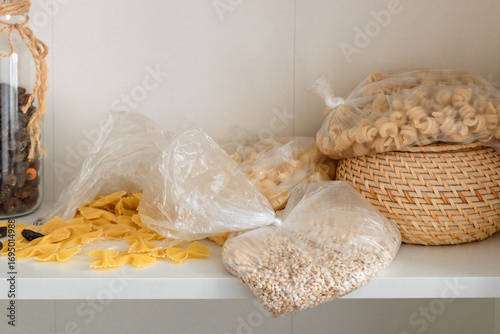 Kitchen pantry, wooden shelves with jars and containers, kitchen mess