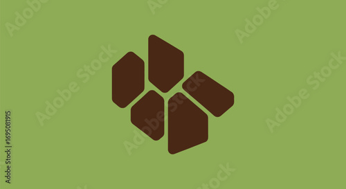 Abstract geometric pattern of brown irregular polygons on a green background.