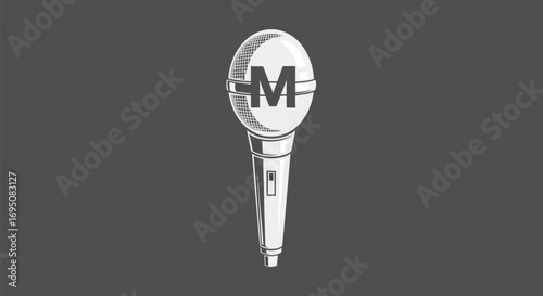 White microphone with letter M on a dark background.