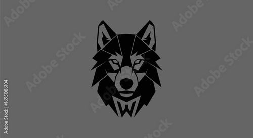 Stylized Black Wolf Head Logo Design with Geometric Features.