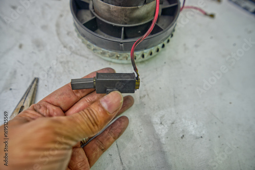 Φωτογραφία Disassembling a Household Vacuum Cleaner