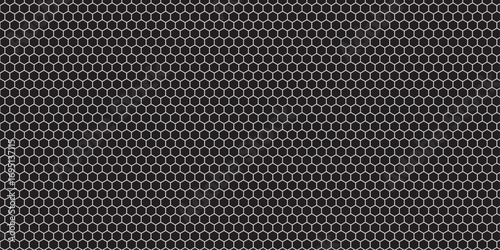 Dark seamless metallic grid pattern from a carbon fiber texture background